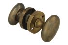 Pair of knobs oval antique brass with round rosette