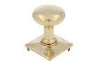 Round door Knob on square rosette polished brass