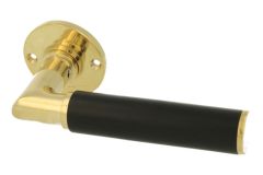 Single door handle with Ø50mm rosette polished brass ebony