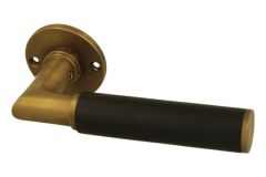 Single door handle with Ø50mm rosette antique brass ebony