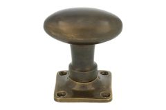 Turnable oval door knob antique brass with square rosette