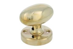 Turnable oval door knob polished brass with round rosette
