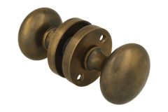 Pair of knobs round antique brass with round rosette