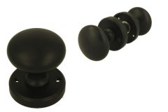 Pair of knobs round brass black with round rosettes