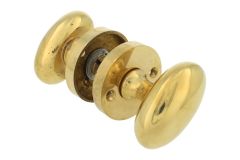 Pair of knobs oval polished brass with round rosette