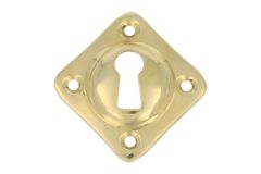 Diagonally mounted key escutcheon polished brass