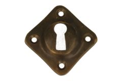 Diagonally mounted key escutcheon antique brass