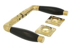 Door handles polished brass ebony pair (1926) + rosettes