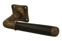 Single door handle with rosette antique brass ebony (1918)