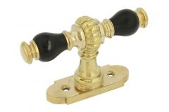 Window handle with rosette polished brass ebony