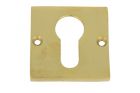 Square euro cylinder escutcheon "Bauhaus" in polished brass