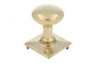 Round door Knob on square rosette polished brass