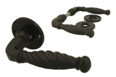 Door handles twisted grip cast iron black on round rosette