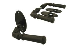Black cast iron classic doorhandles on oval rosette