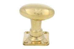 Turnable oval door knob polished brass with square rosette
