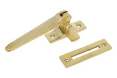 Window fastener reversible polished brass (1915)