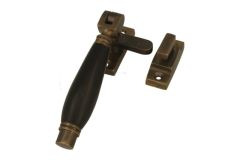 Window fastener (1928) reversible antique brass ebony
