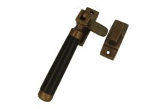 Window fastener reversible (1918) antique brass ebony